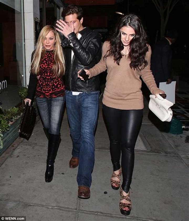 	Adrienne Maloof embarrasses her boy toy in a ridiculous outfit	