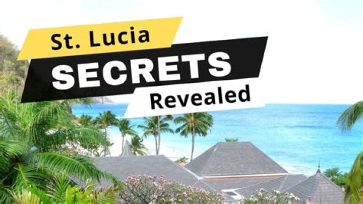 Amy Winehouse sucks her thumb on the beach in St Lucia