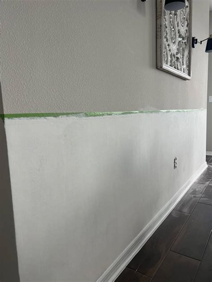 Can you put wainscoting on textured walls?