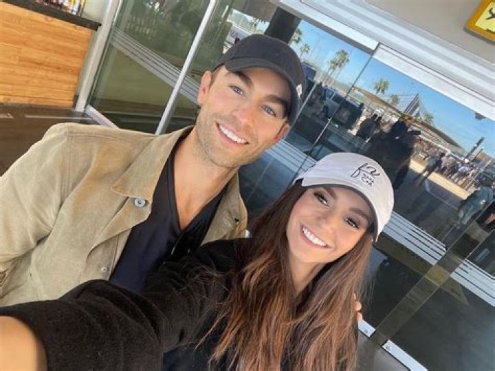 Chace Crawford and JC Chasez staying together in a poolside cabana