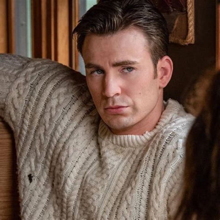 Chris Evans’ thirst-trap involves a cable-knit sweater & playing the piano
