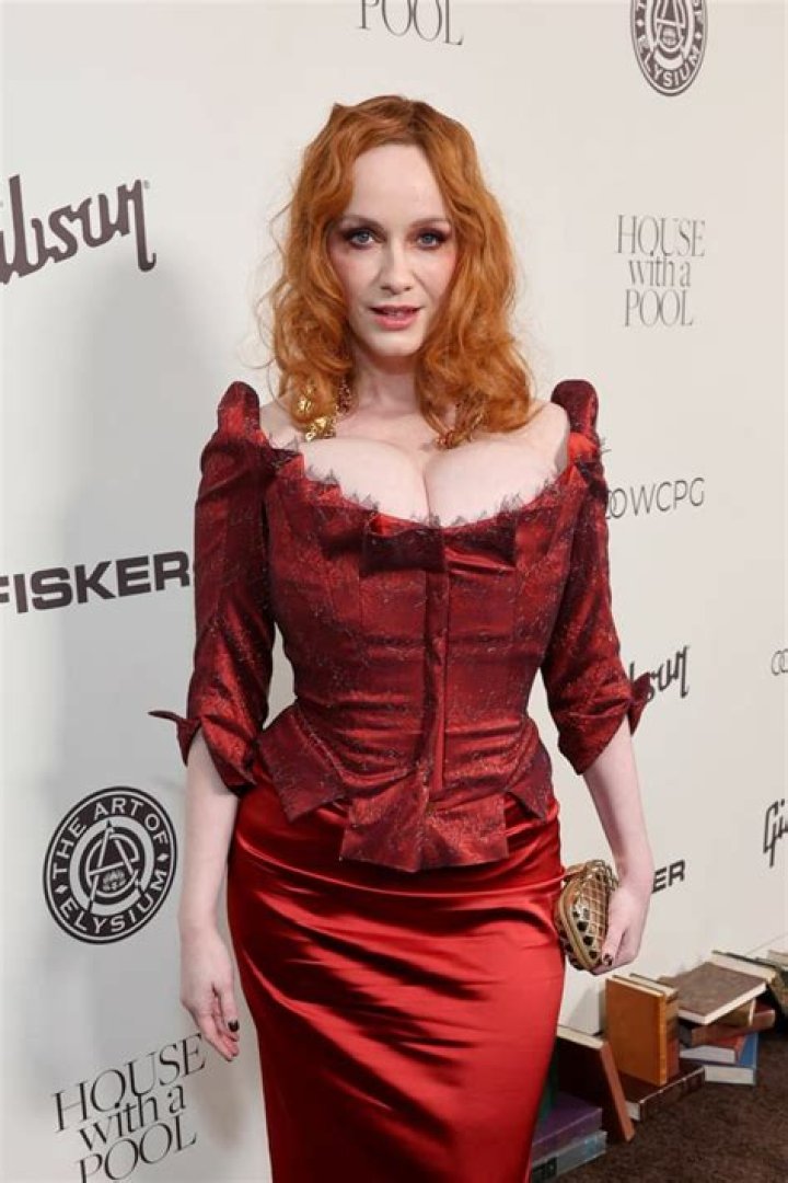 Christina Hendricks wore a corseted look & terrible makeup to the Art of Elysium gala