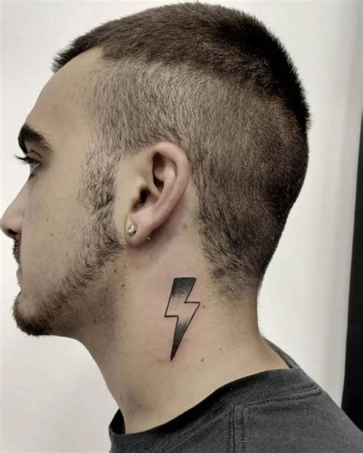 David Raum Lightning Bolt Neck Tattoo Means Victory