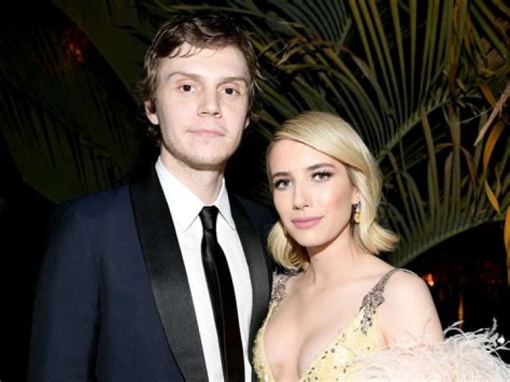 Emma Roberts & Evan Peters got dramatically engaged over the holidays