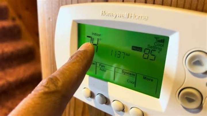 How do I set the temperature on my hunter thermostat?