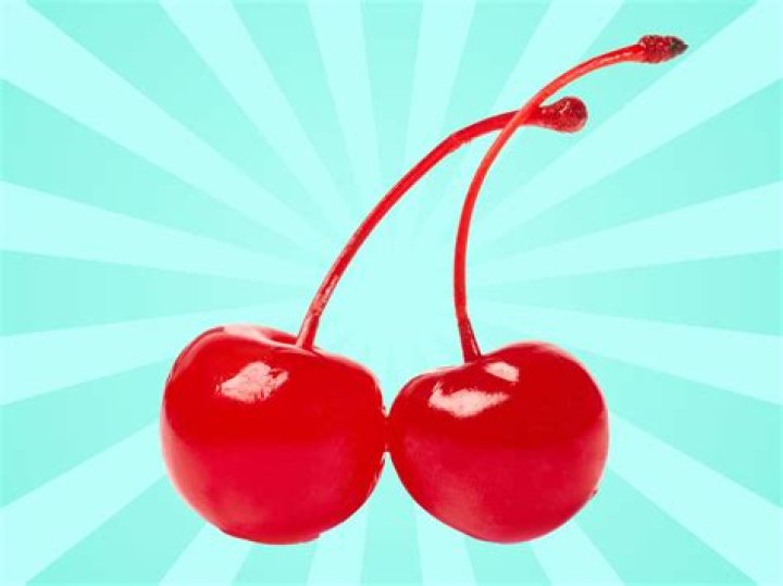 How do they get the pit out of a maraschino cherry?
