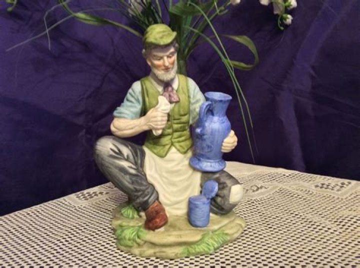 How do you clean bisque porcelain figurines?