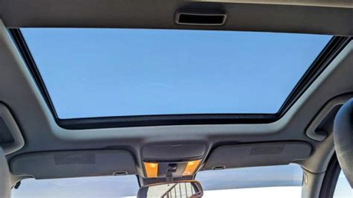 How do you close a sunroof on a Honda Civic?