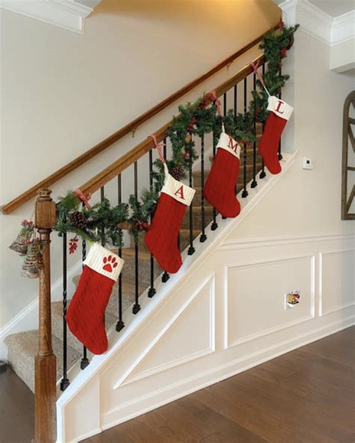 How do you hang Christmas stockings on stair railings?
