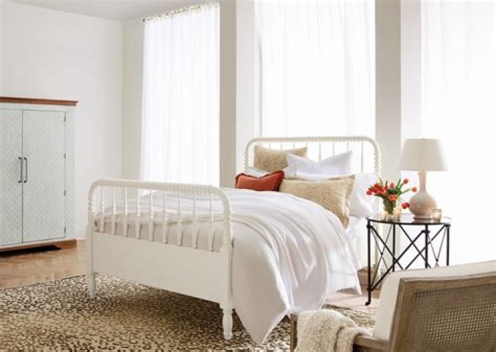 How do you put a bed in front of a window?