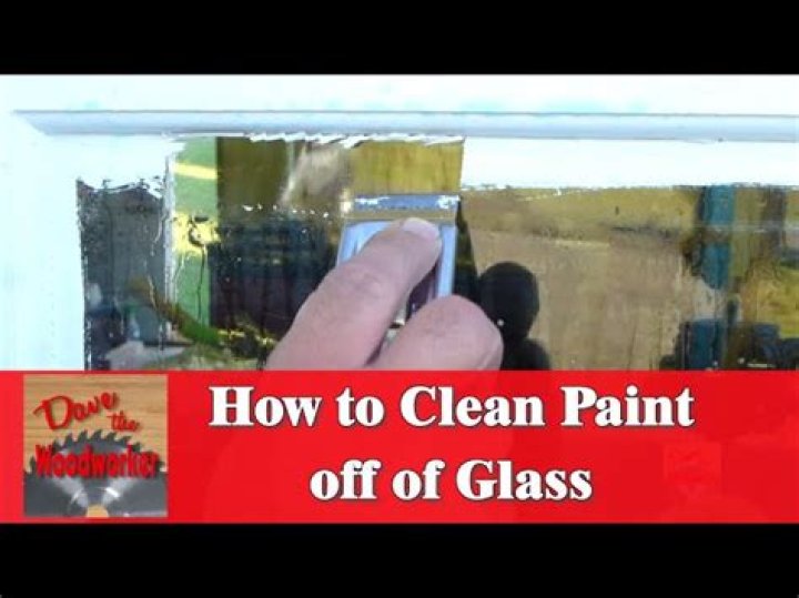 How do you remove paint from glass windows?