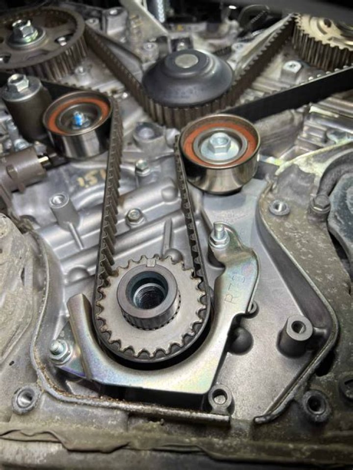 How much does it cost to replace timing belt and water pump Acura TL?