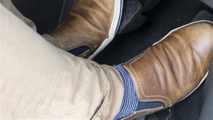 Is it illegal to drive with both feet?