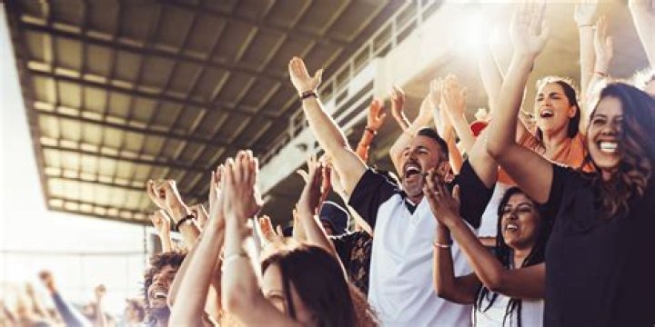 
Is The Kid Cheering For Harmony Tan Over The Stands Her Daughter? 