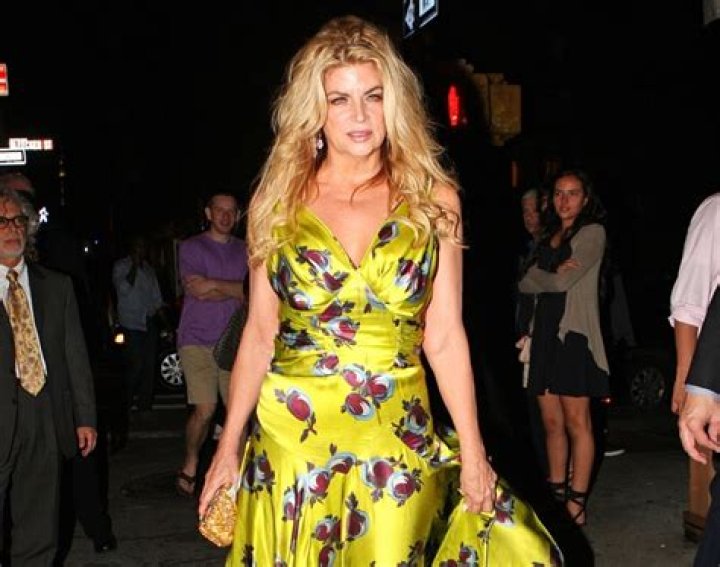 Kirstie Alley in an odd yellow gown: how did this fug thing even get made?
