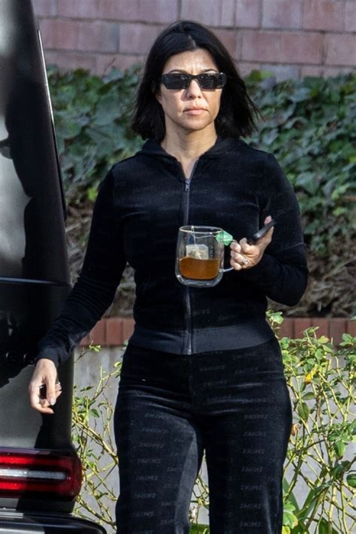Kourtney Kardashian went out in a sheer bodysuit, pajama pants to see Bieber