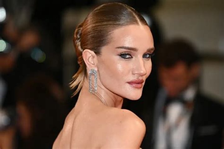 Rosie Huntington-Whiteley in red lamé: showgirl fug or stunning?