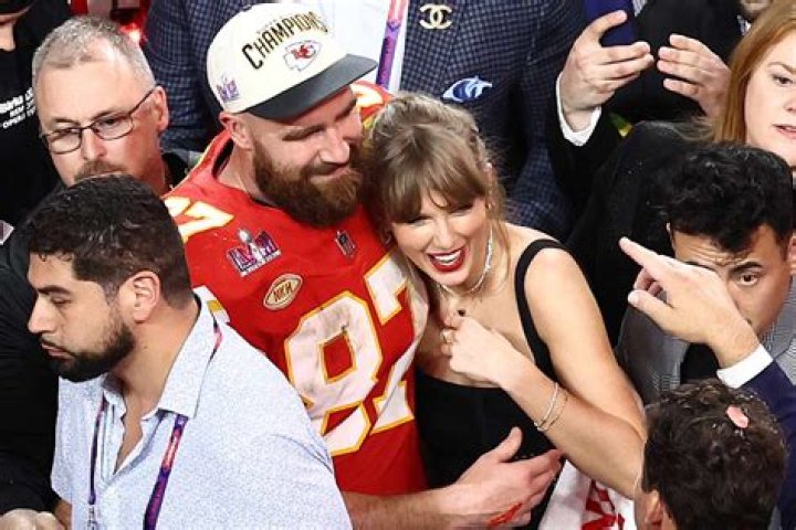 Travis Kelce and Taylor Swift ring in the new year with passionate-filled PDA