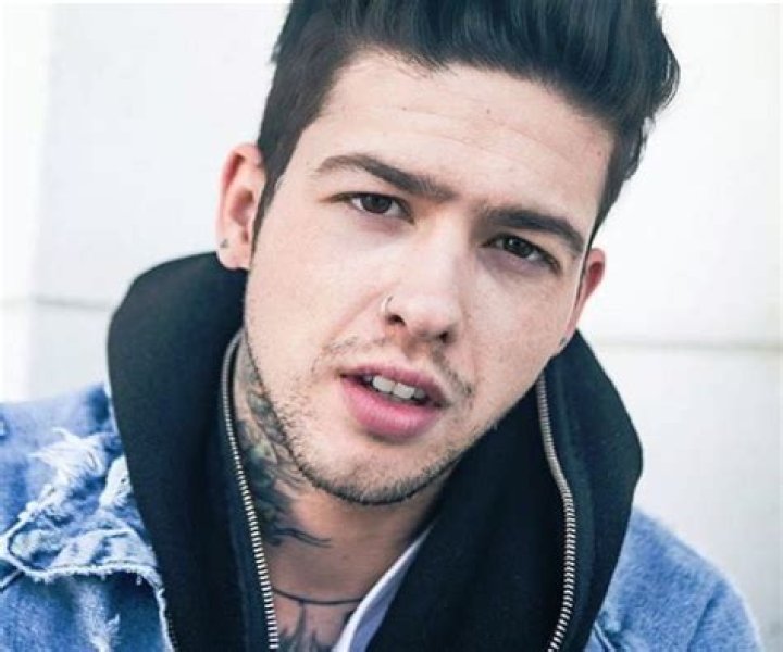 What is Travis Mills famous for?