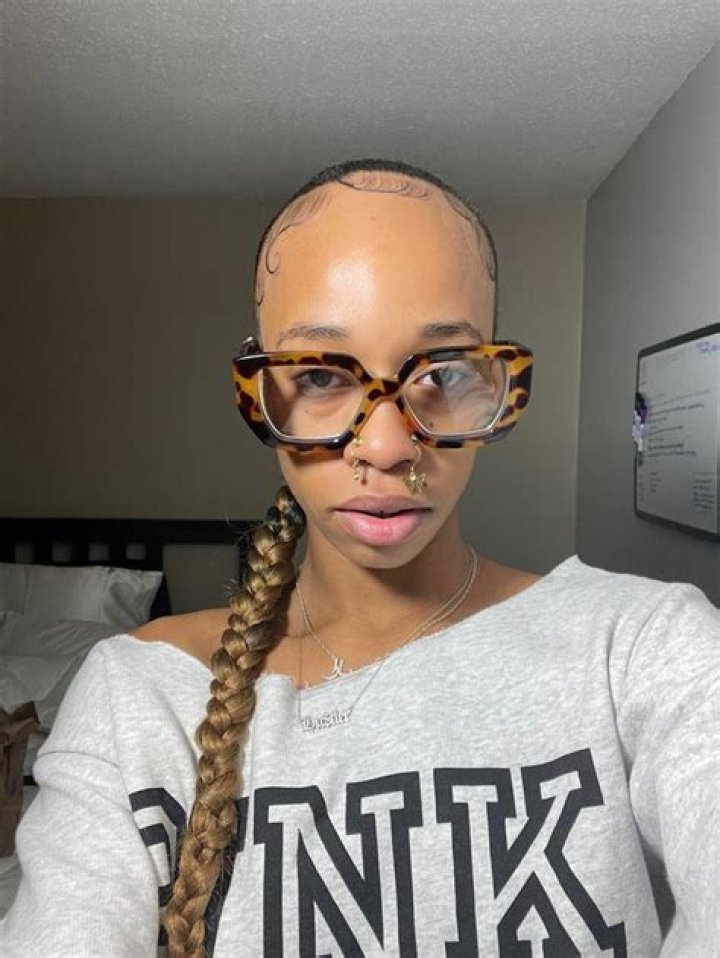 Woman gets huge “Drake” tattoo across her entire forehead